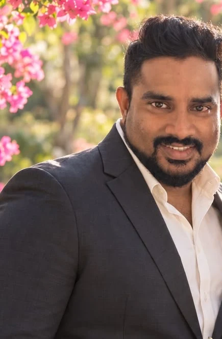 Dhanushka smiling